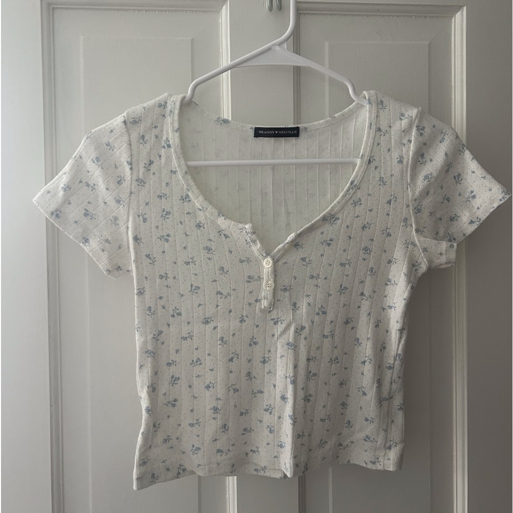 Brandy Melville 3 Button Zelly Top (white with blue flowers)